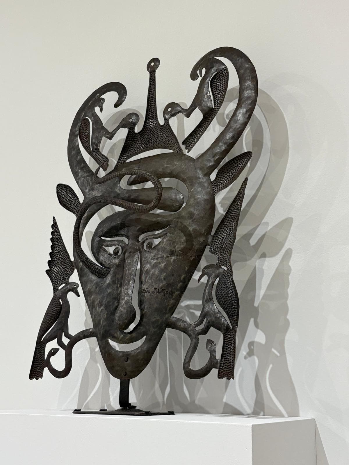 haitian bosmetal steel sculpture of a face